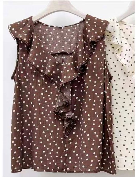 Blusa de lunares con volante