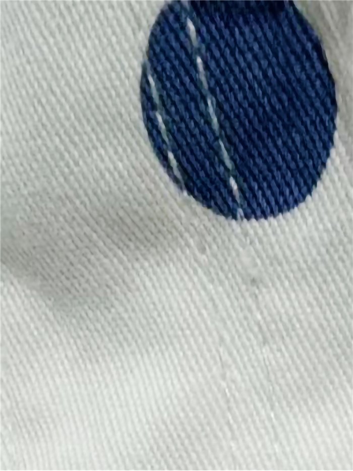 Pantalón vaquero barrel de lunares azul vaquero