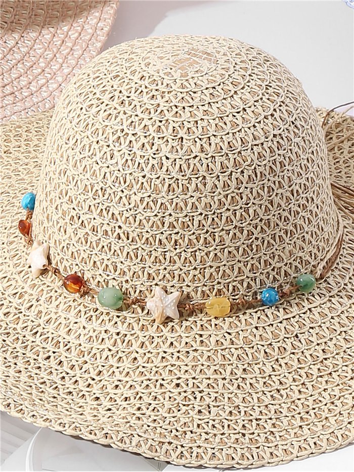 Sombrero de paja con abalorios