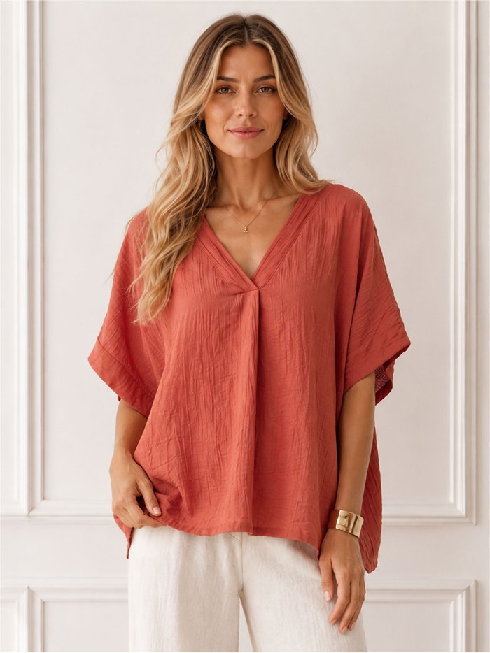 Blusa amplia cuello pico