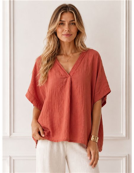 Blusa amplia cuello pico