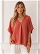 Blusa amplia cuello pico