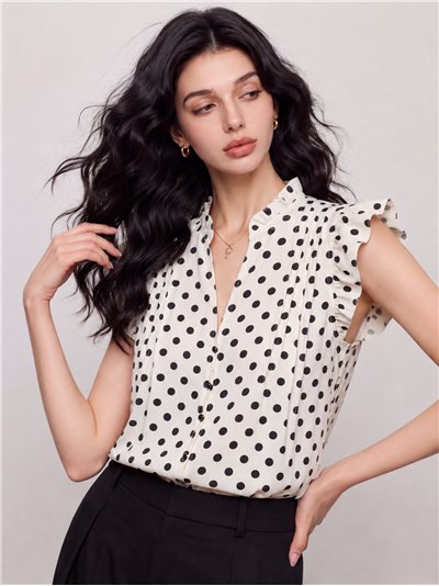 Blusa de lunares con volantes