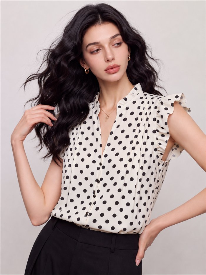 Blusa de lunares con volantes