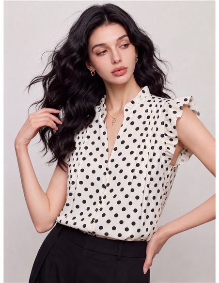 Blusa de lunares con volantes