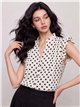 Blusa de lunares con volantes