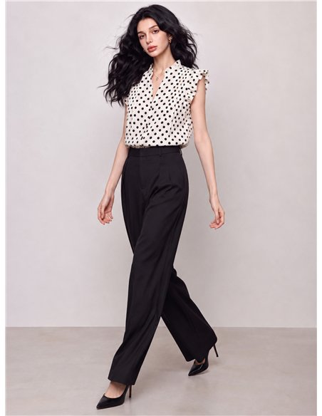 Blusa de lunares con volantes