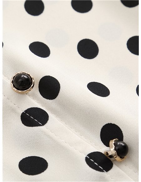 Blusa de lunares con volantes