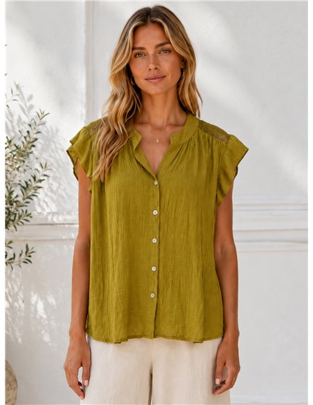 Blusa fluida con botones y rejilla