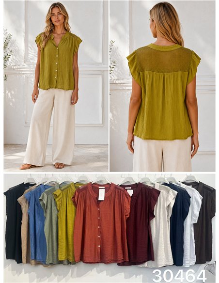 Blusa fluida con botones y rejilla