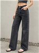 Jeans wide leg gris con tachuelas laterales
