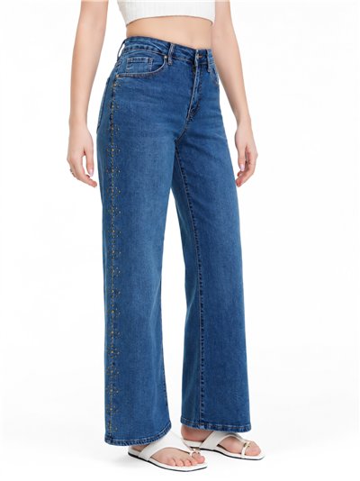Jeans wide leg azul con tachuelas laterales