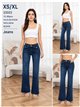 Jeans flare bolsillos solapa