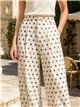 Pantalón bombacho de lunares