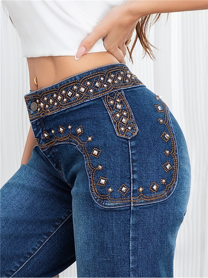 Jeans rectos cintura bordada con tachas