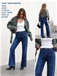 Jeans wide leg con tachas