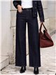 Jeans wide leg con tachas