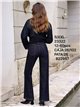 Jeans wide leg con tachas