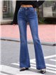 Jeans flare con tachas laterales