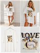Camiseta maxi perfume
