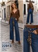 Jeans a gamba larga con cintura intrecciata