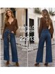 Jeans a gamba larga con cintura intrecciata
