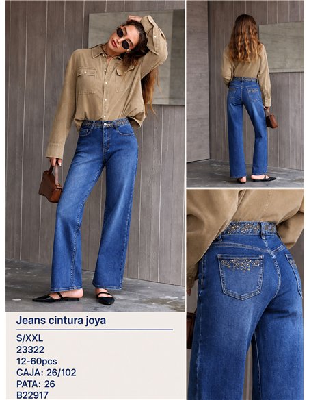 Jeans con cintura ricamata con gioielli.