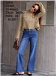Jeans con cintura ricamata con gioielli.