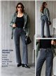 Jeans a gamba dritta con borchie