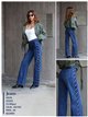 Jeans a gamba dritta con striscia laterale e borchie