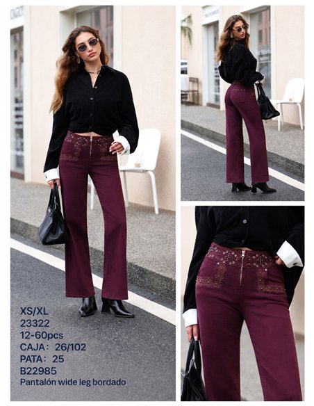Jeans a gamba larga con elastico in vita ricamato e occhielli