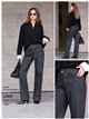 Jeans neri a gamba larga a righe sottili