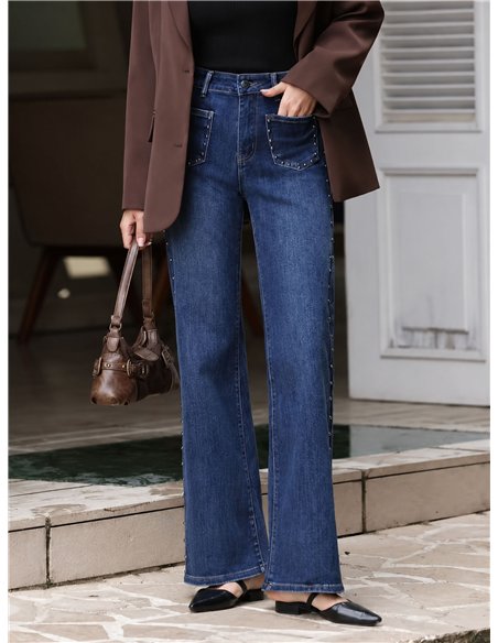 Jeans a gamba larga con borchie laterali