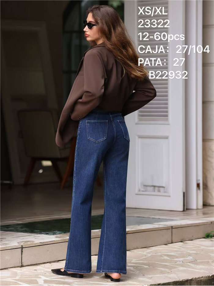 Jeans a gamba larga con borchie laterali