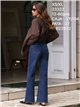 Jeans a gamba larga con borchie laterali