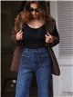 Jeans a gamba larga con borchie laterali