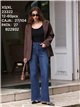 Jeans a gamba larga con borchie laterali