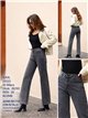 Jeans grigi a gamba dritta con borchie e strass