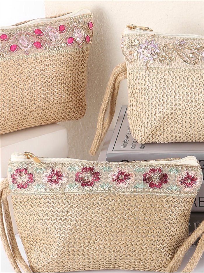 Embroidered raffia cosmetic pouch