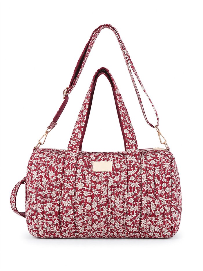 Floral quilted travel bag with strap
