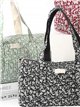 Sac de voyage rembourré à motif floral avec bandoulière