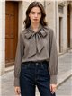 Blusa de cuadros con lazo