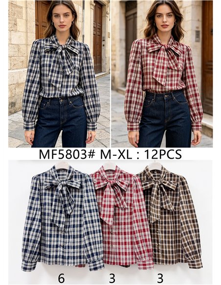 Blusa de cuadros con lazo grande