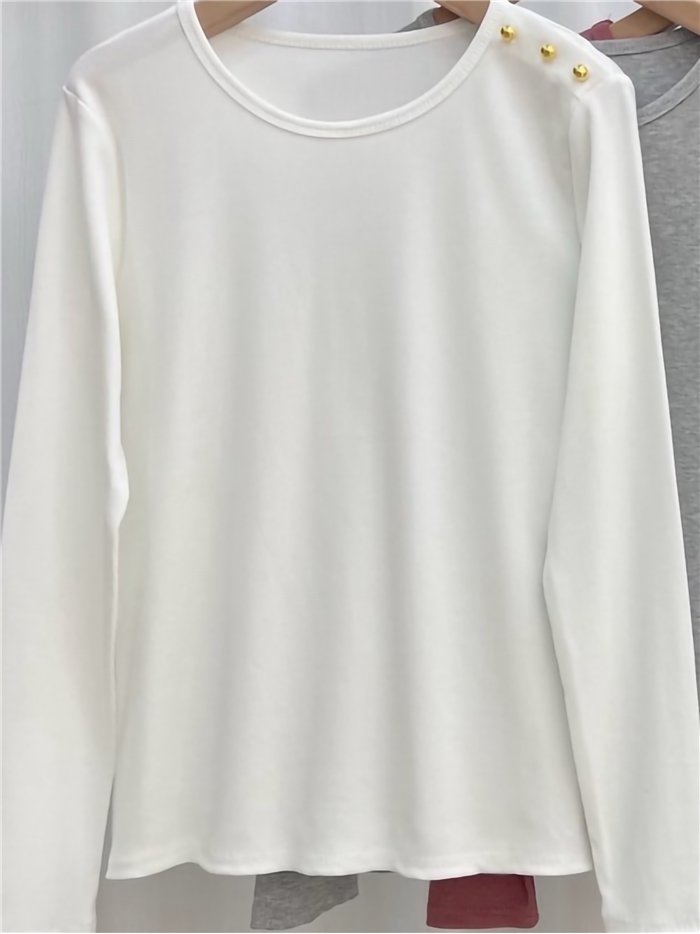 Camiseta botones dorados hombro