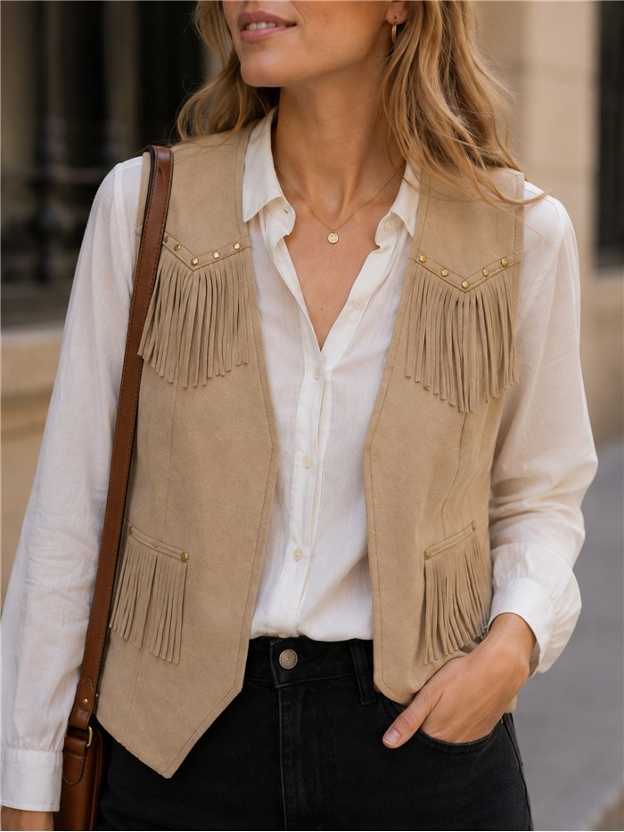 Chaleco efecto ante con flecos y tachas