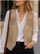Chaleco efecto ante con flecos y tachas