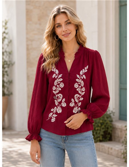 Blusa bordada con cuello volante
