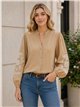 Blusa con bordado floral en manga