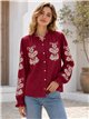 Blusa bordada con cuello volantes