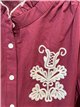 Blusa bordada con cuello volantes